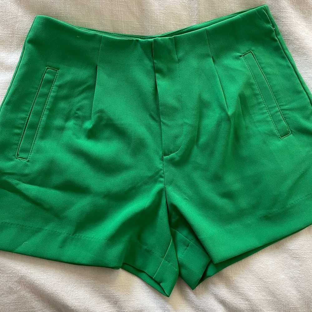 Size 10, pleated shorts